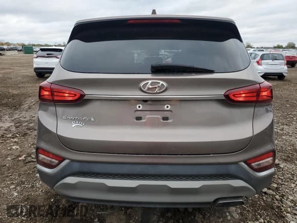✅ 2020 Hyundai Santa Fe SEL • VIN: 5NMS33AD5LH164383 • Lot: 82669465. Wystawiony na Copart z przebiegiem 52 954 mil. Bezpłatny archiwum sprzedaży aukcyjnych z USA i szczegółowy raport historii pojazdu na DreamBid. Zdjęcie 6.