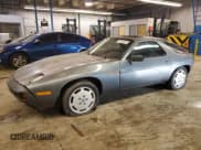 ✅ 1984 Porsche 928 • VIN: WP0JB0925ES861303 • Lot: 41979575. Wystawiony na Copart z przebiegiem 114 593 mil. Bezpłatny archiwum sprzedaży aukcyjnych z USA i szczegółowy raport historii pojazdu na DreamBid. Zdjęcie 1.