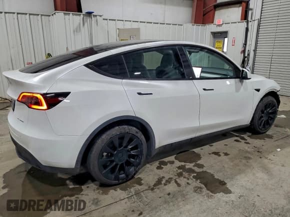 ✅ 2023 Tesla Model Y Long Range • VIN: 7SAYGDEE2PA176991 • Лот: 95689365. Опубликован ранее на Copart с пробегом 40 868 миль. Бесплатный доступ к архиву аукционных продаж из США и подробный отчёт об истории автомобиля на DreamBid. Изображение 3.