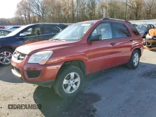 ✅ 2009 Kia Sportage LX • VIN: KNDJF724797560677 • Лот: 92997145. Опубликован ранее на Copart с пробегом Не указан. Бесплатный доступ к архиву аукционных продаж из США и подробный отчёт об истории автомобиля на DreamBid. Изображение 1.