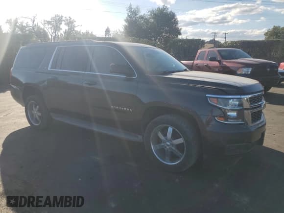✅ 2015 Chevrolet Suburban LT • VIN: 1GNSCJKC2FR238845 • Lot: 82429885. Listed on Copart with 65,404 mi. Free auction sales archive from the USA and detailed vehicle history report at DreamBid. Image 4.