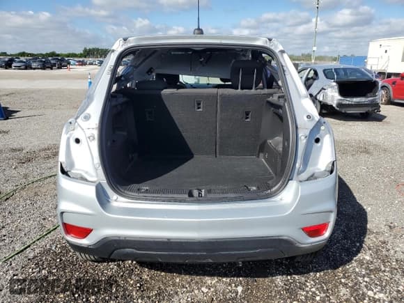 ✅ 2022 Chevrolet Trax LS • VIN: KL7CJNSM8NB551339 • Lot: 86807785. Listed on Copart with 26,783 mi. Free auction sales archive from the USA and detailed vehicle history report at DreamBid. Image 6.