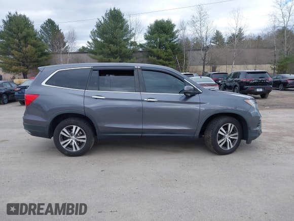 ✅ 2017 Honda Pilot EX-L • VIN: 5FNYF6H52HB024950 • Lot: 42051084. Listed on IAAI with Not provided. Free auction sales archive from the USA and detailed vehicle history report at DreamBid. Image 12.