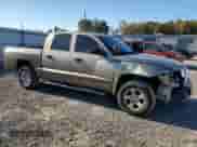 2006 Dodge Dakota SLT with VIN 1D7HE48K56S519839, listed as a Copart auction lot 77270724 with 202,320 mi miles and Salvage title. Bid and sale history available at DreamBid. Image 4.