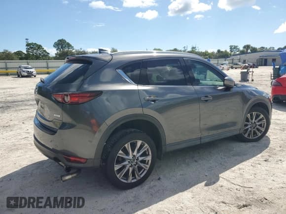✅ 2019 Mazda CX-5 Grand Touring • VIN: JM3KFADM7K0622051 • Lot: 86213585. Listed on Copart with 68,022 mi. Free auction sales archive from the USA and detailed vehicle history report at DreamBid. Image 3.