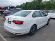 ✅ 2016 Volkswagen Jetta Sport • VIN: 3VWD17AJ3GM228366 • Lot: 43018875. Wystawiony na IAAI z przebiegiem 117 286 mil. Bezpłatny archiwum sprzedaży aukcyjnych z USA i szczegółowy raport historii pojazdu na DreamBid. Zdjęcie 4.