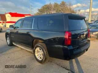 2015 Chevrolet Suburban z VIN 1GNSKHEC4FR252172, wystawiony jako Copart lot #91075985 z przebiegiem 213 365 mil mil oraz Czysty tytuł • Clean title. Historia ofert i sprzedaży dostępna na DreamBid. Obrazek 3.