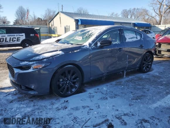 ✅ 2022 Mazda 3 Carbon Edition • VIN: 3MZBPACL5NM312817 • Lot: 45314185. Listed on Copart with 37,279 mi. Free auction sales archive from the USA and detailed vehicle history report at DreamBid. Image 1.