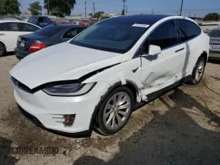 ✅ 2017 Tesla Model X 90D • VIN: 5YJXCBE2XHF042040 • Lot: 71727155. Wystawiony na Copart z przebiegiem 66 925 mil. Bezpłatny archiwum sprzedaży aukcyjnych z USA i szczegółowy raport historii pojazdu na DreamBid. Zdjęcie 1.