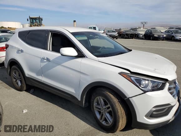 ✅ 2018 Hyundai Santa Fe 2.4L • VIN: 5NMZTDLB4JH083792 • Лот: 62271733. Опубликован ранее на Copart с пробегом Не указан. Бесплатный доступ к архиву аукционных продаж из США и подробный отчёт об истории автомобиля на DreamBid. Изображение 4.