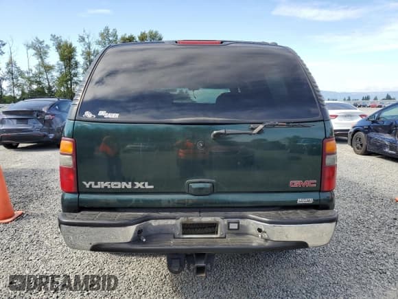 ✅ 2001 GMC Yukon XL SLT • VIN: 3GKFK16T31G161083 • Lot: 65451015. Wystawiony na Copart z przebiegiem 198 615 mil. Bezpłatny archiwum sprzedaży aukcyjnych z USA i szczegółowy raport historii pojazdu na DreamBid. Zdjęcie 6.