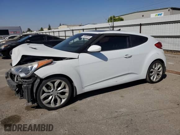 2013 Hyundai Veloster w/Black Int с VIN KMHTC6AD4DU147327, выставлен на аукционе Copart как лот 70406034 с пробегом 121 381 миль миль и Списание • Salvage title. История ставок и продаж доступна на DreamBid. Изображение 1.