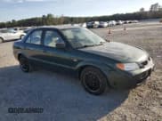 ✅ 2002 Mazda Protege DX • VIN: JM1BJ225021618037 • Lot: 92897355. Wystawiony na Copart z przebiegiem 160 409 mil. Bezpłatny archiwum sprzedaży aukcyjnych z USA i szczegółowy raport historii pojazdu na DreamBid. Zdjęcie 4.