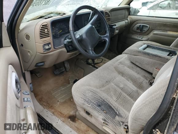 ✅ 1998 GMC Sierra 1500 • VIN: 1GTEK19R2WE559262 • Лот: 62186945. Опубликован ранее на Copart с пробегом 217 981 миль. Бесплатный доступ к архиву аукционных продаж из США и подробный отчёт об истории автомобиля на DreamBid. Изображение 8.