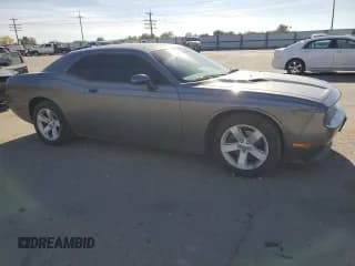 ✅ 2012 Dodge Challenger SXT • VIN: 2C3CDYAG0CH228029 • Lot: 77434704. Wystawiony na Copart z przebiegiem 133 272 mil. Bezpłatny archiwum sprzedaży aukcyjnych z USA i szczegółowy raport historii pojazdu na DreamBid. Zdjęcie 4.