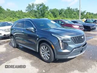 ✅ 2021 Cadillac XT4 FWD Premium Luxury • VIN: 1GYFZCR42MF007617 • Лот: 42437974. Опубликован ранее на IAAI с пробегом 126 071 миль. Бесплатный доступ к архиву аукционных продаж из США и подробный отчёт об истории автомобиля на DreamBid. Изображение 1.