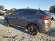 ✅ 2021 Hyundai Tucson Sport • VIN: KM8J33AL0MU329622 • Lot: 91411445. Wystawiony na Copart z przebiegiem 87 821 mil. Bezpłatny archiwum sprzedaży aukcyjnych z USA i szczegółowy raport historii pojazdu na DreamBid. Zdjęcie 2.
