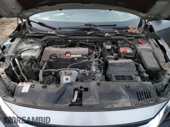 ✅ 2018 Honda Civic LX • VIN: 2HGFC2F5XJH598063 • Лот: 92181965. Опубликован ранее на Copart с пробегом 122 959 миль. Бесплатный доступ к архиву аукционных продаж из США и подробный отчёт об истории автомобиля на DreamBid. Изображение 11.