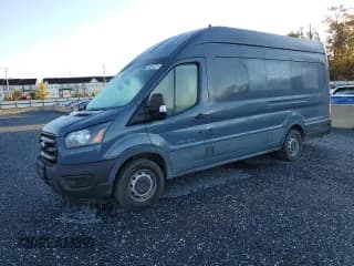 ✅ 2020 Ford Transit Cargo • VIN: 1FTBR3X82LKB27420 • Lot: 84182085. Listed on Copart with 88,784 mi. Free auction sales archive from the USA and detailed vehicle history report at DreamBid. Image 1.