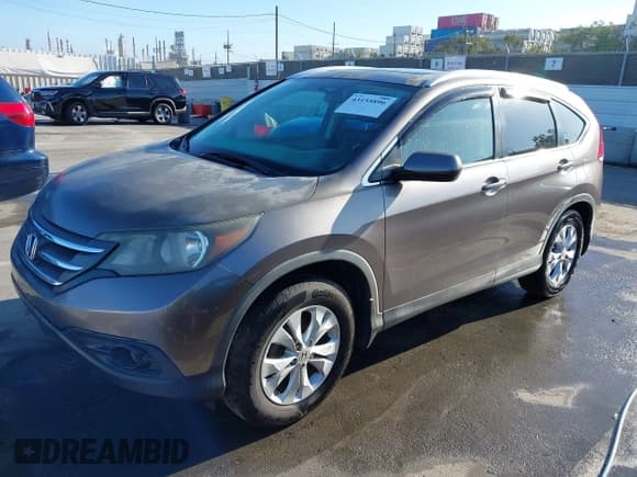✅ 2012 Honda CR-V EX-L • VIN: 5J6RM3H7XCL006304 • Lot: 43155896. Listed on IAAI with 208,889 mi. Free auction sales archive from the USA and detailed vehicle history report at DreamBid. Image 18.