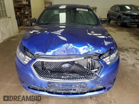 ✅ 2014 Ford Taurus SHO • VIN: 1FAHP2KT2EG119321 • Lot: 55212945. Listed on Copart with 169,986 mi. Free auction sales archive from the USA and detailed vehicle history report at DreamBid. Image 5.