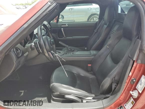 ✅ 2013 Mazda MX-5 Miata Grand Touring • VIN: JM1NC2PF0D0227374 • Lot: 65728335. Listed on Copart with 80,143 mi. Free auction sales archive from the USA and detailed vehicle history report at DreamBid. Image 7.