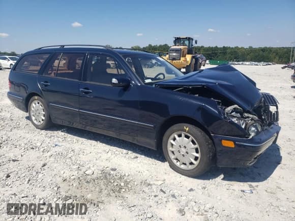 ✅ 2001 Mercedes-Benz E 320/430 4 Matic • VIN: WDBJH82J91X057063 • Lot: 70235274. Listed on Copart with 174,846 mi. Free auction sales archive from the USA and detailed vehicle history report at DreamBid. Image 4.