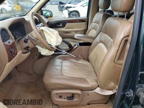 ✅ 2003 GMC Envoy SLT • VIN: 1GKET16P936191818 • Lot: 53270645. Listed on Copart with 130,357 mi. Free auction sales archive from the USA and detailed vehicle history report at DreamBid. Image 7.