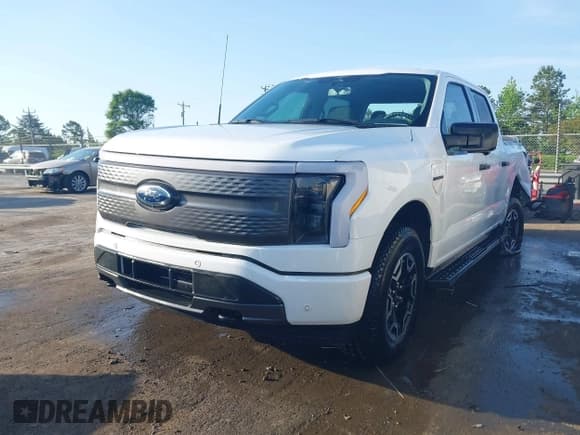 ✅ 2023 Ford F-150 Lightning Pro • VIN: 1FTVW1EL6PWG34059 • Лот: 42010900. Опубликован ранее на IAAI с пробегом 20 759 миль. Бесплатный доступ к архиву аукционных продаж из США и подробный отчёт об истории автомобиля на DreamBid. Изображение 19.