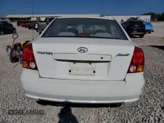 2005 Hyundai Accent GLS с VIN KMHCG45C55U616484, выставлен на аукционе Copart как лот 81498465 с пробегом 34 578 миль миль и Списание • Salvage title. История ставок и продаж доступна на DreamBid. Изображение 6.