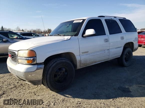 ✅ 2003 GMC Yukon SLE • VIN: 1GKEC13V83R279146 • Lot: 42035465. Listed on Copart with 299,154 mi. Free auction sales archive from the USA and detailed vehicle history report at DreamBid. Image 1.