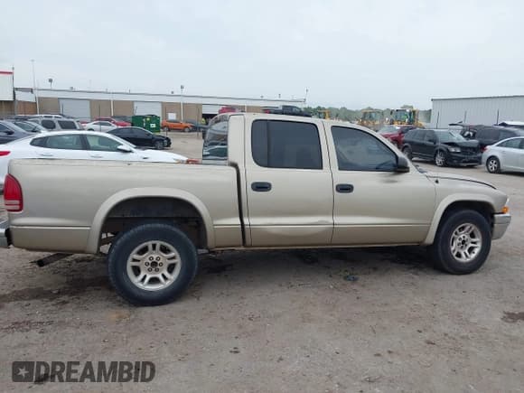 ✅ 2004 Dodge Dakota SLT • VIN: 1D7HL48N84S619527 • Lot: 42484398. Listed on IAAI with 275,998 mi. Free auction sales archive from the USA and detailed vehicle history report at DreamBid. Image 14.
