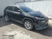 ✅ 2021 Jeep Cherokee Latitude • VIN: 1C4PJLCB8MD107063 • Lot: 60847615. Wystawiony na Copart z przebiegiem 102 506 mil. Bezpłatny archiwum sprzedaży aukcyjnych z USA i szczegółowy raport historii pojazdu na DreamBid. Zdjęcie 4.