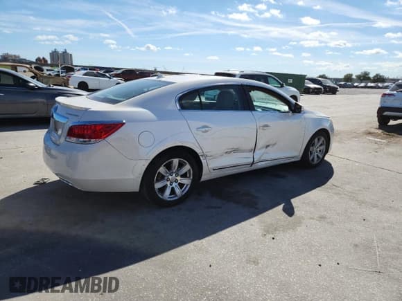 ✅ 2012 Buick LaCrosse Premium 2 • VIN: 1G4GF5E32CF293359 • Лот: 92724945. Опубликован ранее на Copart с пробегом 120 265 миль. Бесплатный доступ к архиву аукционных продаж из США и подробный отчёт об истории автомобиля на DreamBid. Изображение 3.
