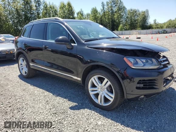 ✅ 2013 Volkswagen Touareg Lux • VIN: WVGEF9BP0DD001565 • Lot: 63070845. Listed on Copart with 123,788 mi. Free auction sales archive from the USA and detailed vehicle history report at DreamBid. Image 4.