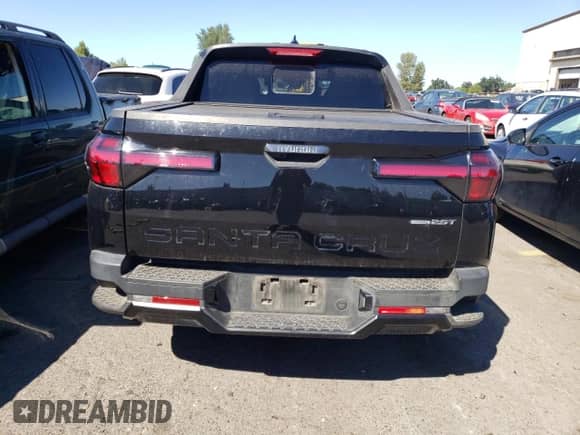 2023 Hyundai Santa Cruz Night Edition с VIN 5NTJCDAF6PH071871, выставлен на аукционе Copart как лот 64869504 с пробегом 14 432 миль миль и Списание • Salvage title. История ставок и продаж доступна на DreamBid. Изображение 6.