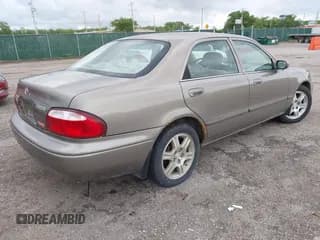 ✅ 2001 Mazda 626 LX • VIN: 1YVGF22DX15246285 • Лот: 42157656. Опубликован ранее на IAAI с пробегом 213 070 миль. Бесплатный доступ к архиву аукционных продаж из США и подробный отчёт об истории автомобиля на DreamBid. Изображение 4.