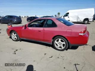 ✅ 1997 Honda Prelude • VIN: JHMBB614XVC000826 • Лот: 49745955. Опубликован ранее на Copart с пробегом 224 134 миль. Бесплатный доступ к архиву аукционных продаж из США и подробный отчёт об истории автомобиля на DreamBid. Изображение 2.