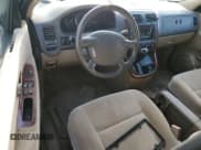 ✅ 2003 Kia Sedona LX • VIN: KNDUP131436436987 • Lot: 51501555. Listed on Copart with Not provided. Free auction sales archive from the USA and detailed vehicle history report at DreamBid. Image 8.