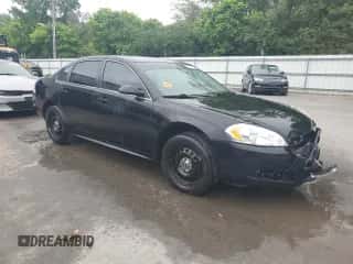 2013 Chevrolet Impala Police with VIN 2G1WD5E38D1140492, listed as a Copart auction lot 60832155 with 121,114 mi miles and Salvage title. Bid and sale history available at DreamBid. Image 4.