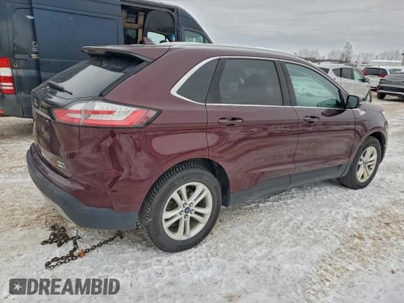 ✅ 2019 Ford Edge SEL • VIN: 2FMPK4J98KBC26197 • Lot: 95855585. Listed on Copart with 110,699 mi. Free auction sales archive from the USA and detailed vehicle history report at DreamBid. Image 3.