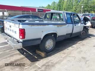1990 Dodge Dakota z VIN 1B7FL23X0LS641390, wystawiony jako IAAI lot #42826429 z przebiegiem 186 919 mil mil oraz . Historia ofert i sprzedaży dostępna na DreamBid. Obrazek 4.