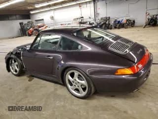 ✅ 1998 Porsche 911 • VIN: WP0ZZZ99ZWS310288 • Лот: 74909953. Опубликован ранее на Copart с пробегом Не указан. Бесплатный доступ к архиву аукционных продаж из США и подробный отчёт об истории автомобиля на DreamBid. Изображение 2.