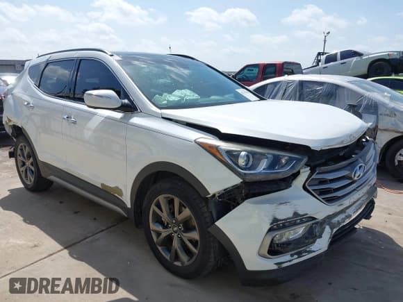 ✅ 2017 Hyundai Santa Fe Ultimate • VIN: 5NMZW4LA1HH042352 • Lot: 42753102. Listed on IAAI with 86,473 mi. Free auction sales archive from the USA and detailed vehicle history report at DreamBid. Image 1.