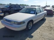 ✅ 1996 Ford Crown Victoria LX • VIN: 2FALP74W3TX130673 • Лот: 42759121. Опубликован ранее на IAAI с пробегом 230 964 миль. Бесплатный доступ к архиву аукционных продаж из США и подробный отчёт об истории автомобиля на DreamBid. Изображение 2.