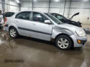 ✅ 2007 Kia Rio LX • VIN: KNADE123376246349 • Lot: 87293694. Listed on Copart with 181,361 mi. Free auction sales archive from the USA and detailed vehicle history report at DreamBid. Image 4.