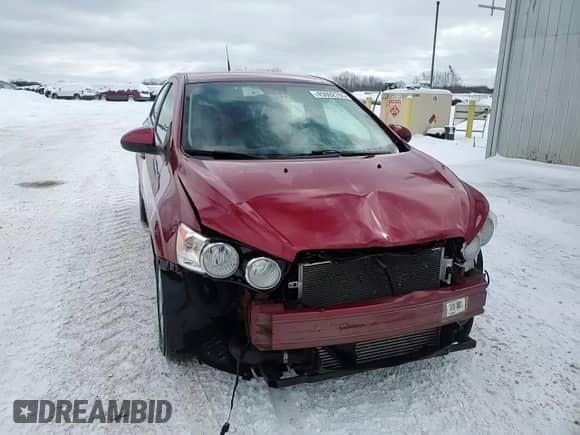 2012 Chevrolet Sonic LT z VIN 1G1JC5SB7C4222161, wystawiony jako Copart lot #45002765 z przebiegiem 94 450 mil mil oraz Czysty tytuł • Clean title. Historia ofert i sprzedaży dostępna na DreamBid. Obrazek 14.