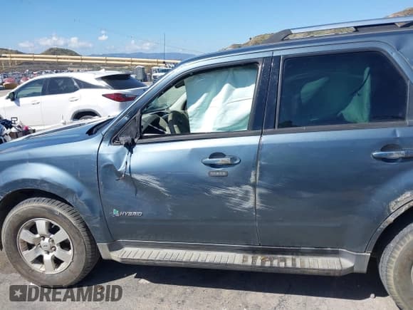 ✅ 2011 Ford Escape Hybrid • VIN: 1FMCU4K36BKC04787 • Lot: 41947008. Wystawiony na IAAI z przebiegiem 132 403 mil. Bezpłatny archiwum sprzedaży aukcyjnych z USA i szczegółowy raport historii pojazdu na DreamBid. Zdjęcie 6.