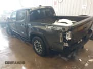 ✅ 2022 Toyota Tacoma SR • VIN: 3TMCZ5AN7NM533090 • Lot: 43813384. Listed on IAAI with 30,624 mi. Free auction sales archive from the USA and detailed vehicle history report at DreamBid. Image 3.