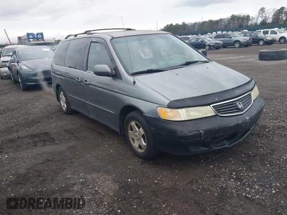 ✅ 2001 Honda Odyssey EX • VIN: 2HKRL18661H618490 • Lot: 43773737. Listed on IAAI with 141,985 mi. Free auction sales archive from the USA and detailed vehicle history report at DreamBid. Image 1.